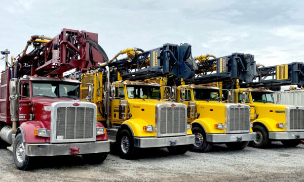 red truck and yellow trucks