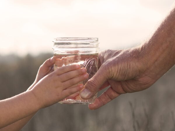 hands holding water